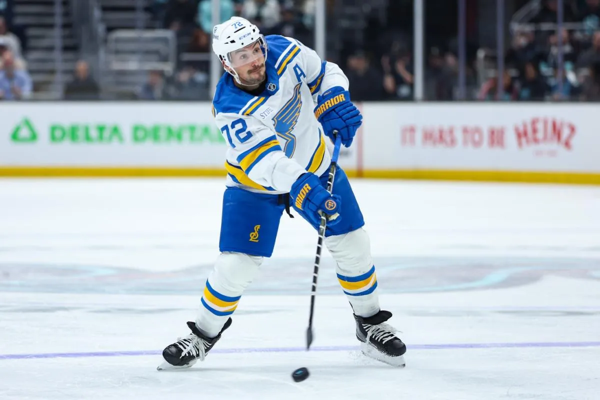 St. Louis Blues defenseman Justin Faulk (72) attempts a shot on goal in the first period against the Seattle Kraken at Climate Pledge Arena.