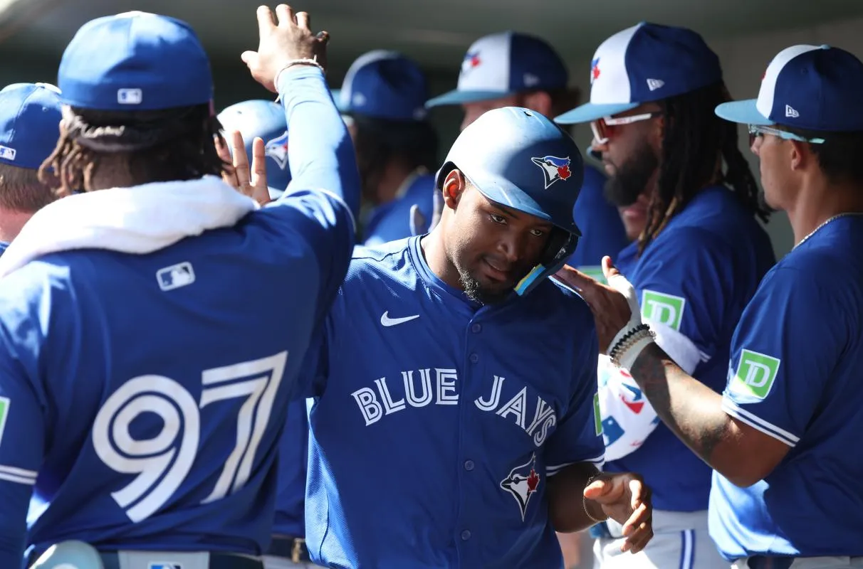 Sarasota, Florida, USA;Toronto Blue Jays second base Orelvis Martinez (13) scores a run during the fourth inning against the Baltimore Orioles at Ed Smith Stadium.