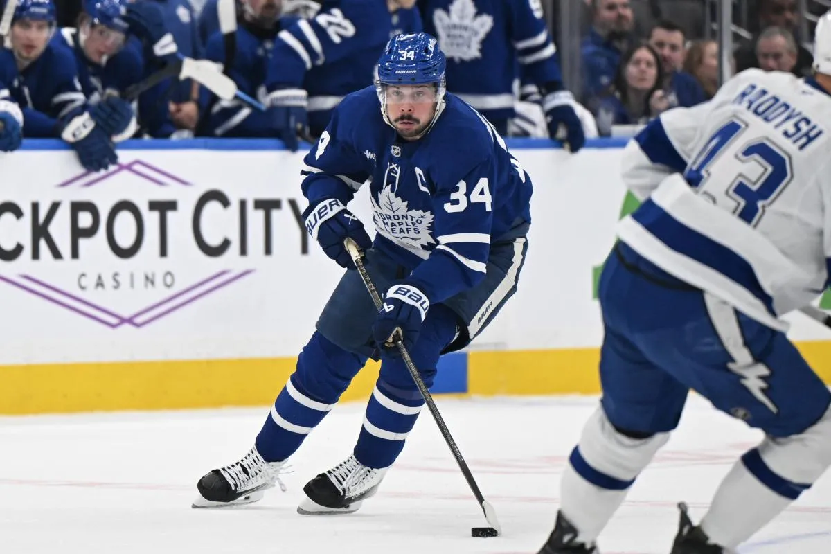 Toronto Maple Leafs forward Auston Matthews (34) skates with the puck against the Tampa Bay Lightning in the first period at Scotiabank Arena.