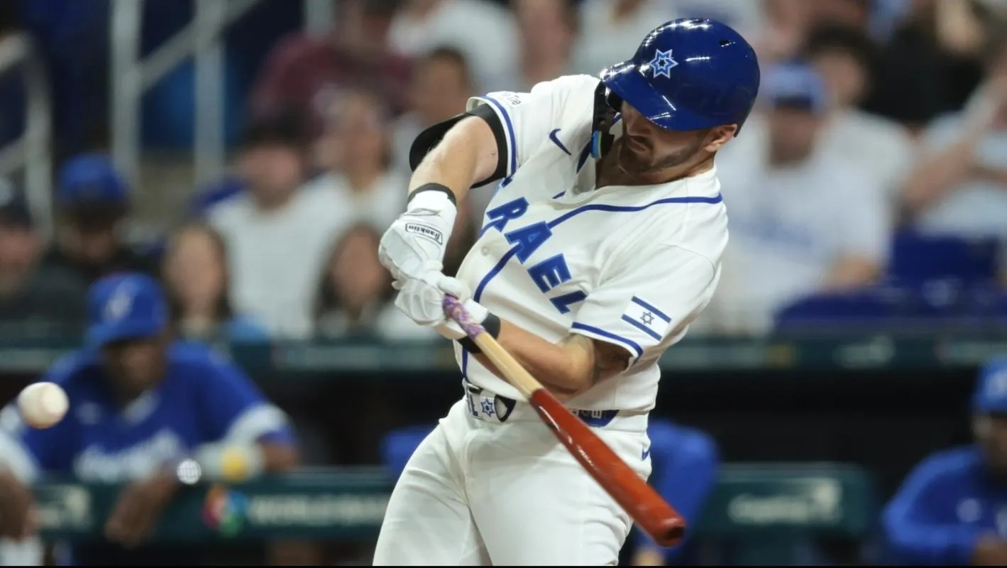 Israel first baseman Spencer Horwitz (13) hits a single against Nicaragua during the fifth inning at loanDepot Park.