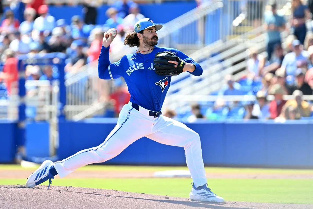 Toronto Blue Jays starting pitcher Dylan Cease (84) throws a pitch in the first inning against the Philadelphia Phillies during spring training at TD Ballpark.