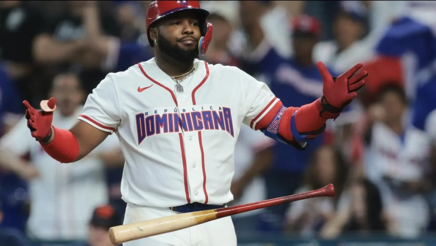 Dominican Republic first baseman Vladimir Guerrero Jr. (27) reacts after hitting a two-run home run against the Netherlands during the third inning at loanDepot Park.