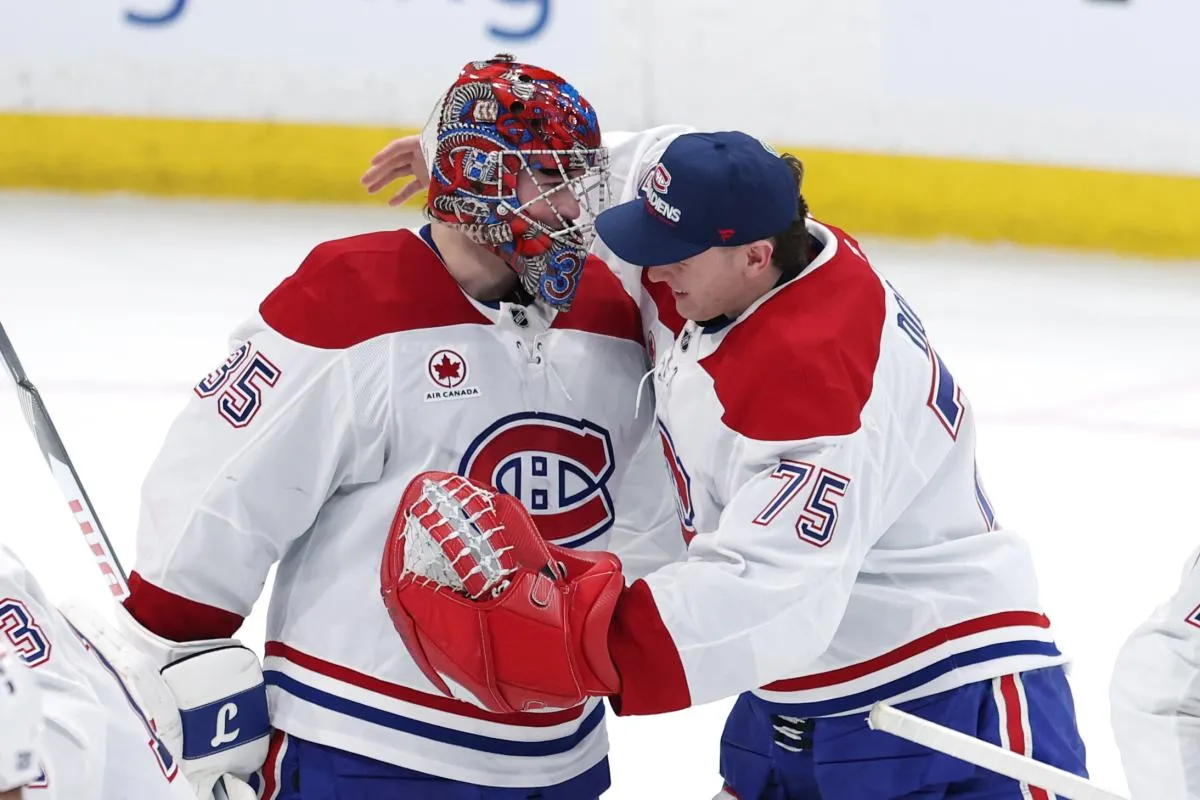 Winnipeg, Manitoba, CAN;Montreal Canadiens goaltender Samuel Montembeault (35) and goaltender Jakub Dobes (75) celebrate a victory against the Winnipeg Jets at Canada Life Centre