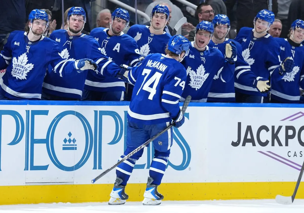 Toronto Maple Leafs center Bobby McMann (74) celebrates at the bench after scoring an empty net goal against the Florida Panthers during the third period at Scotiabank Arena.