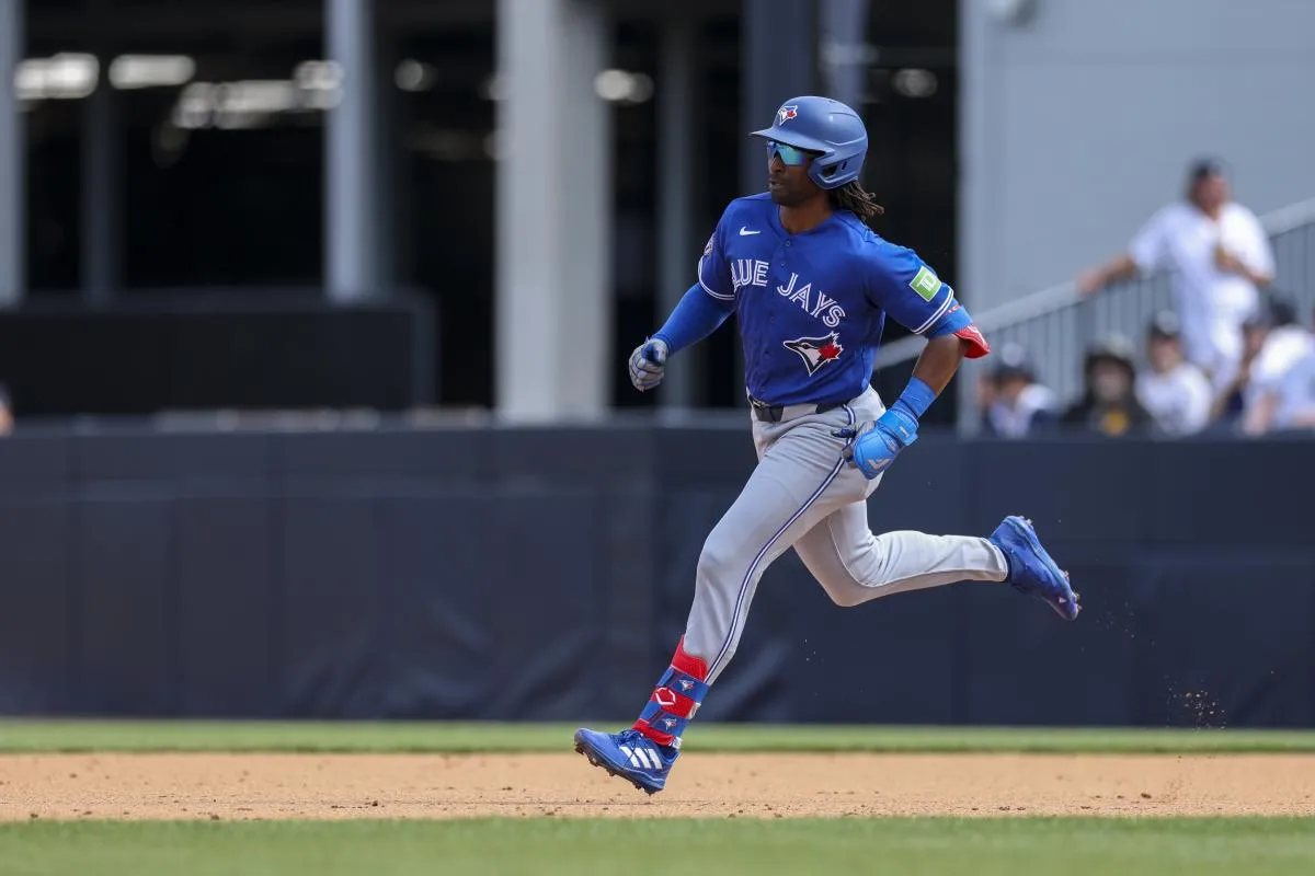 Toronto Blue Jays third baseman Charles McAdoo (26) hits during the third inning against the Detroit Tigers at Publix Field at Joker Marchant Stadium.