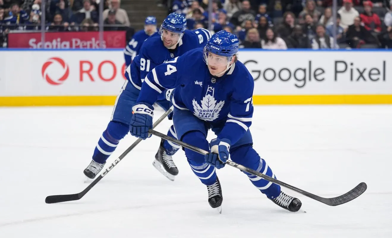 Toronto Maple Leafs forward John Tavares (91) and Toronto Maple Leafs forward Bobby McMann (74) pursue the puck against the Colorado Avalanche at Scotiabank Arena.