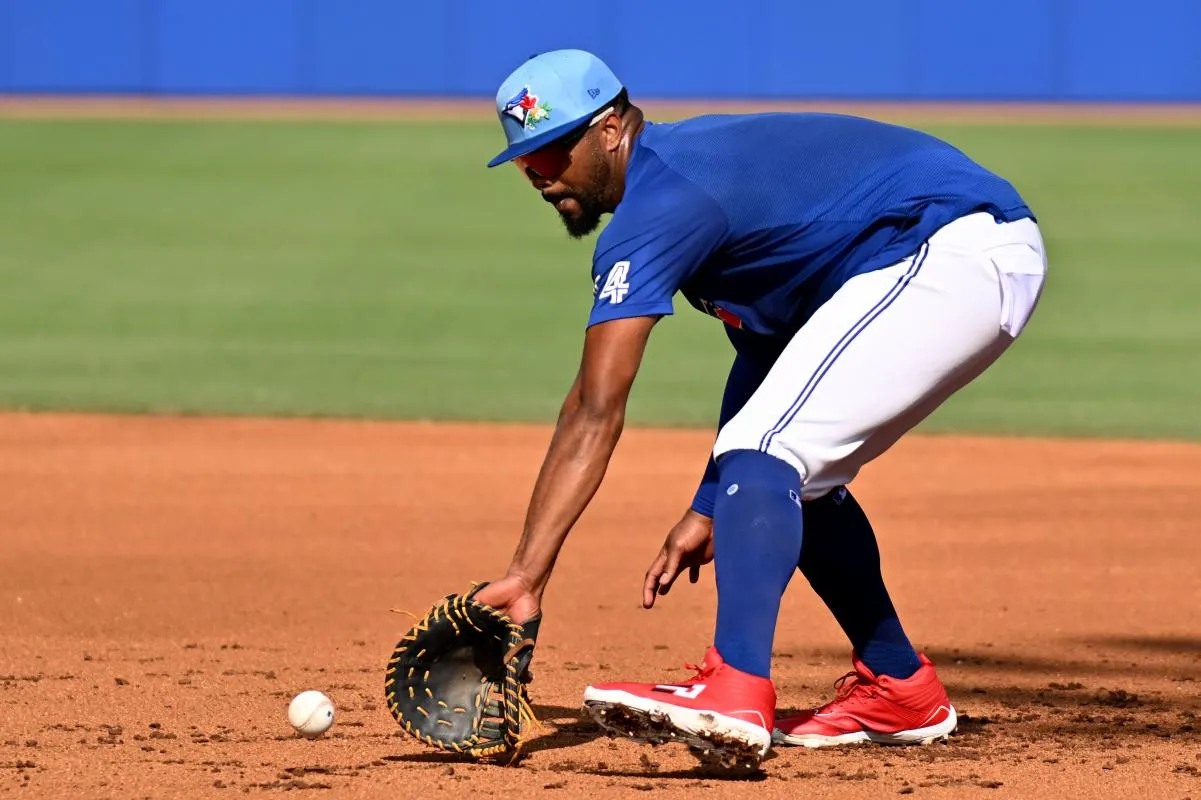 Toronto Blue Jays infielder Eloy Jimenez (74) fields a ground ball during spring training at Bobby Mattick Training Center at Englebert Complex.