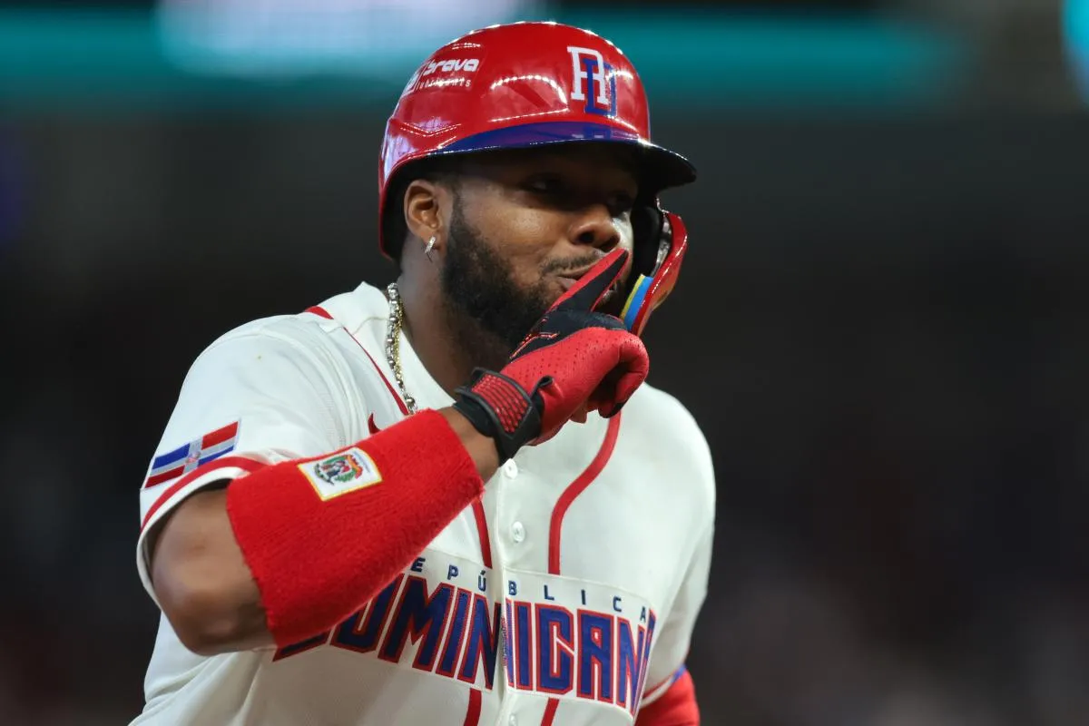 Dominican Republic first baseman Vladimir Guerrero Jr. (27) reacts after hitting a two-run home run against the Netherlands during the third inning at loanDepot Park.