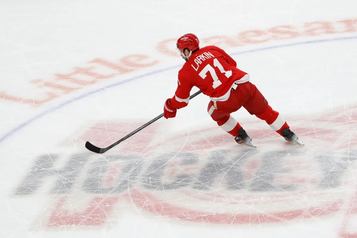 Detroit Red Wings center Dylan Larkin (71) skates with the puck in the first period against the Vegas Golden Knights at Little Caesars Arena.