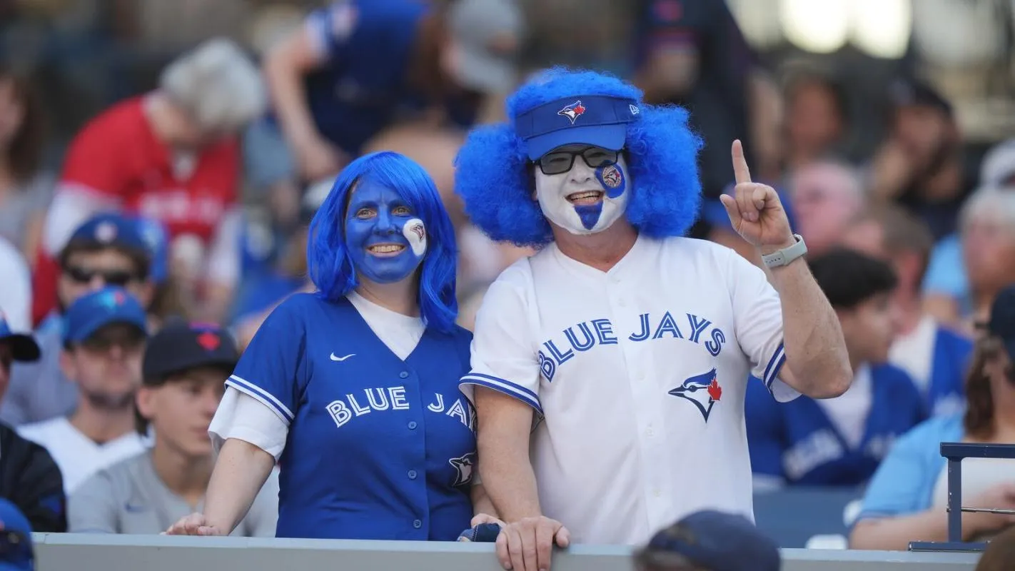 Toronto Blue Jays fans cheer ahead of the start of the American League Division Series MLB playoff series between the Toronto Blue Jays and the New York Yankees in Toronto on Saturday, October 4, 2025.