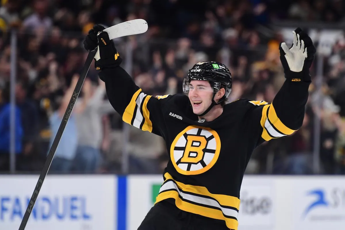 Boston Bruins center Fraser Minten (93) reacts after defeating the Los Angeles Kings in overtime at TD Garden.