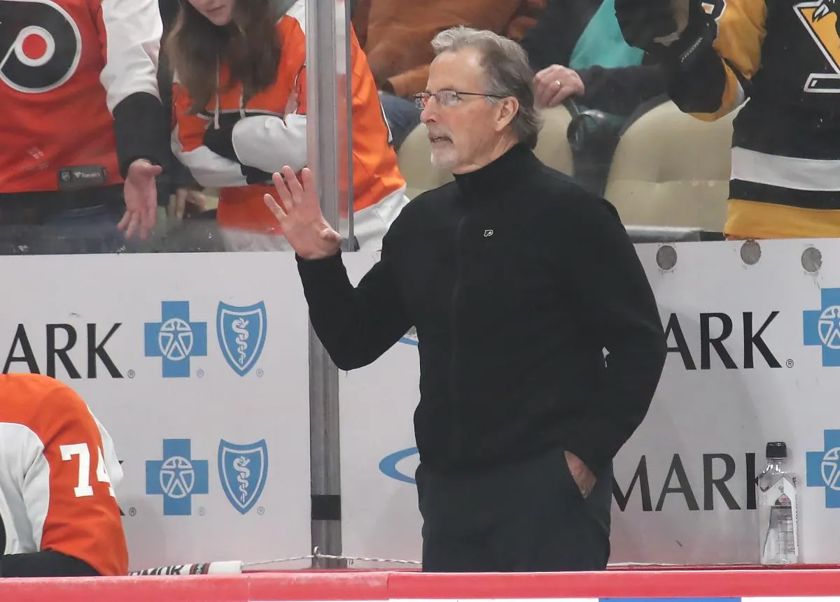 Philadelphia Flyers head coach John Tortorella reacts on the bench against the Pittsburgh Penguins during the second period at PPG Paints Arena.