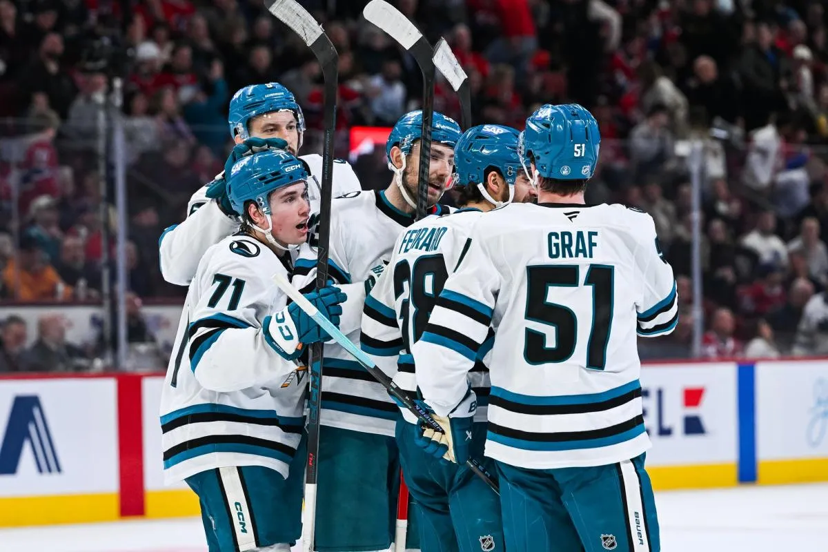 San Jose Sharks center Macklin Celebrini (71) celebrates with his teammates his second goal of the game against the Montreal Canadiens during the third period at Bell Centre.: