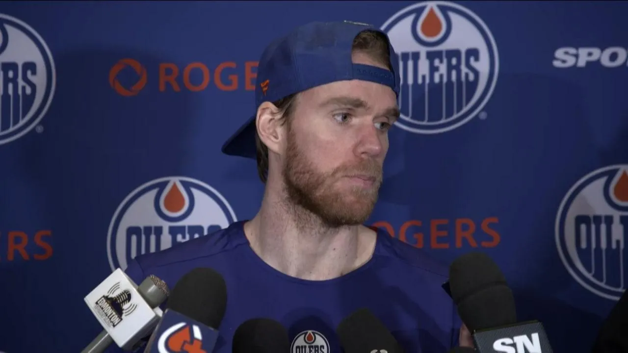 Edmonton Oilers captain Connor McDavid speaking to the media during a press conference.
