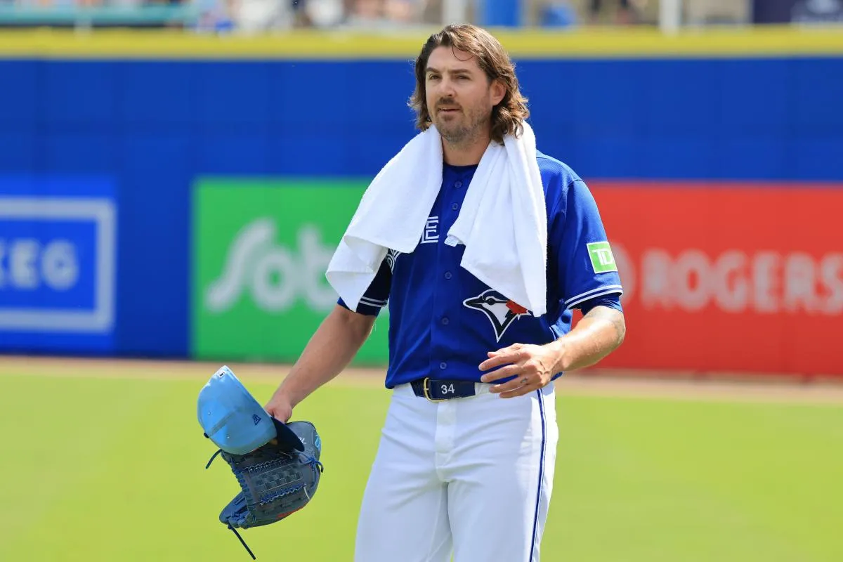Toronto Blue Jays starting pitcher Kevin Gausman (34) walks to the dugout before the game against Team Canada at TD Ballpark.