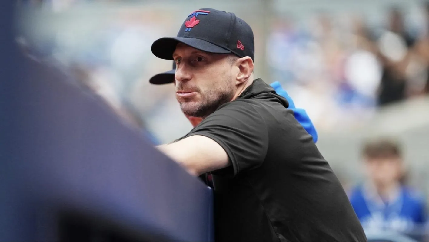 Toronto Blue Jays pitcher Max Scherzer (31) looks out from the dugout before a game against the Chicago White Sox at Rogers Centre.