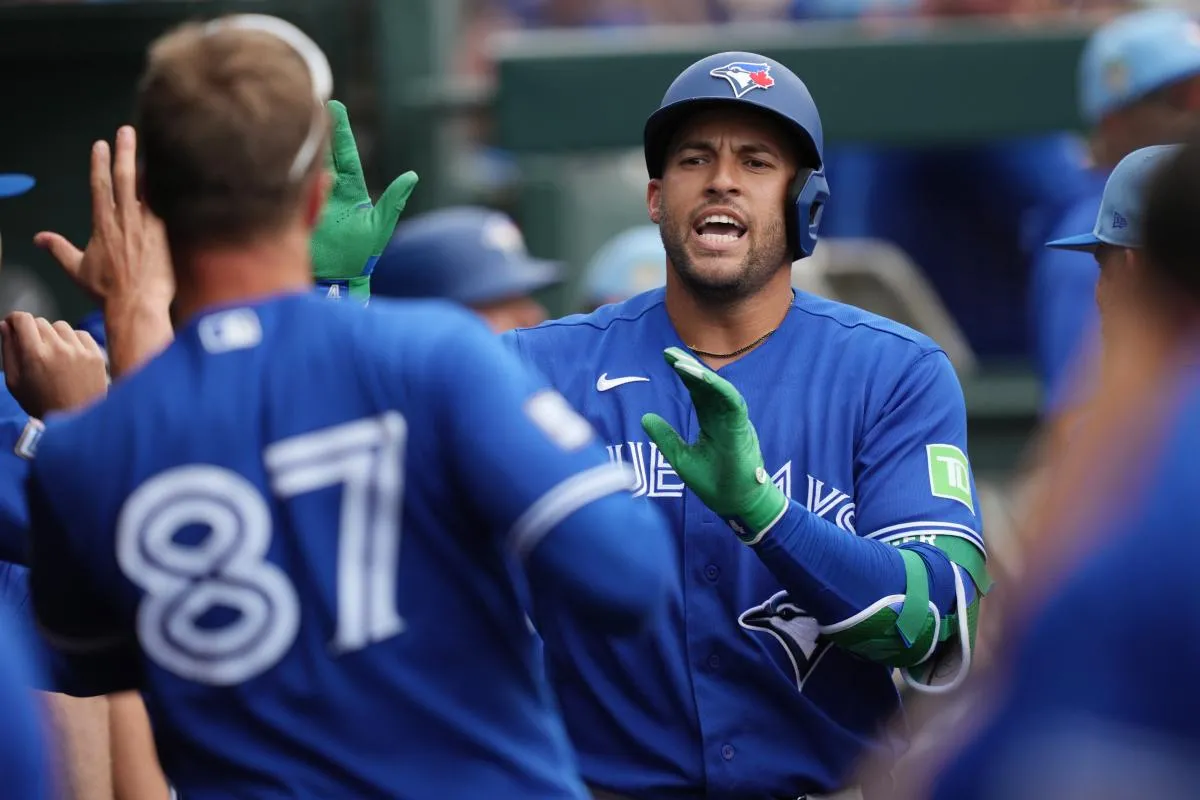Toronto Blue Jays designated hitter George Springer (4) celebrates a home run in the first inning against the Miami Marlins at Roger Dean Chevrolet Stadium