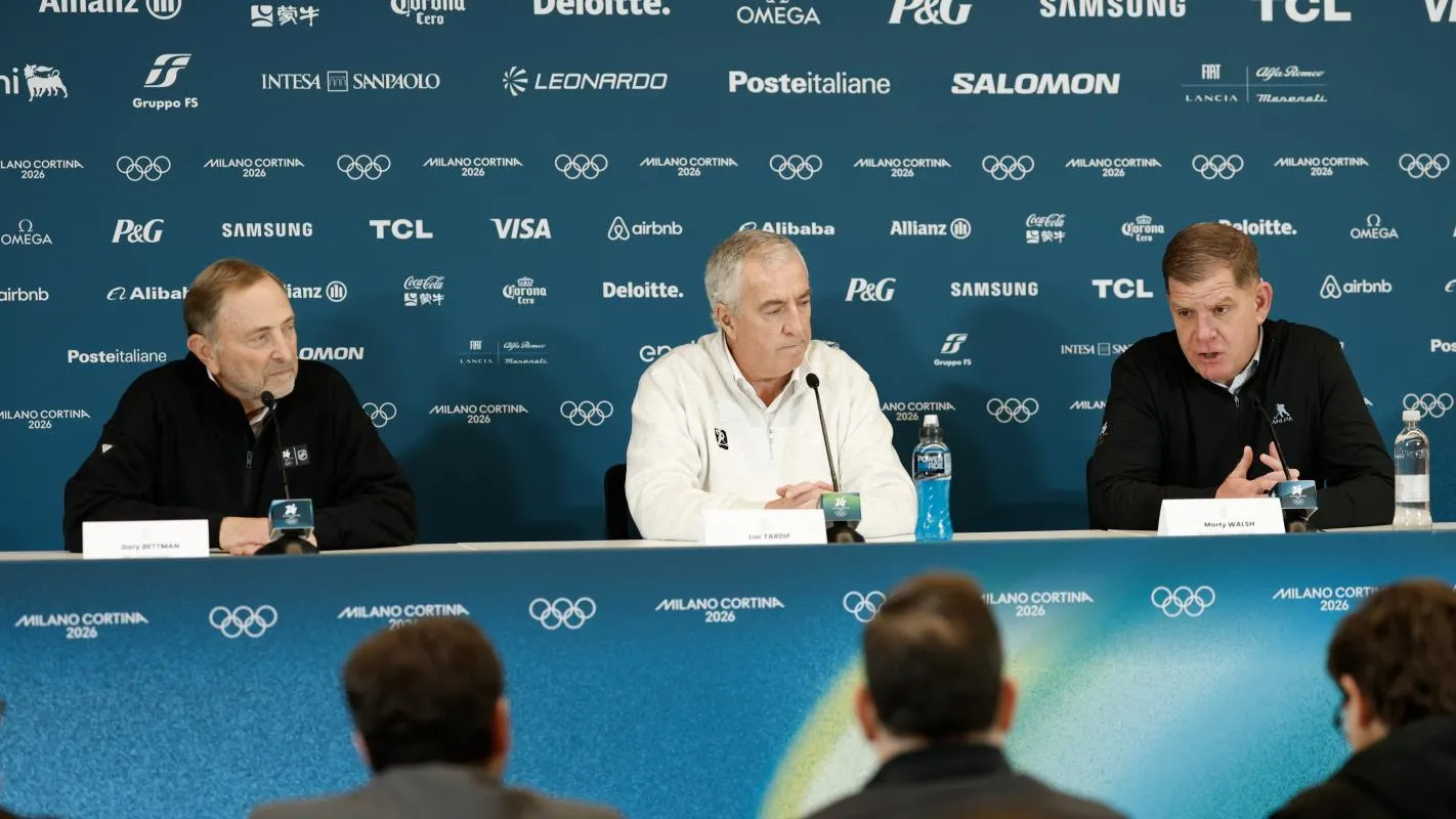 From left NHL commissioner Gary Bettman, IIHF President Luc Tardif, and NHLPA executive director Marty Walsh at a men's ice hockey press conference during the Milano Cortina 2026 Olympic Winter Games at Milano Santagiulia Ice Hockey Arena.