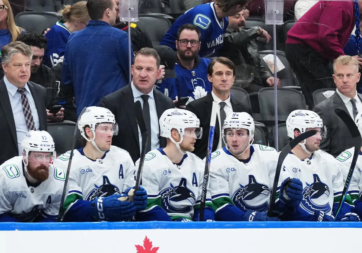 Vancouver Canucks head coach Adam Foote watches the action against the Toronto Maple Leafs during the third period at Scotiabank Arena.