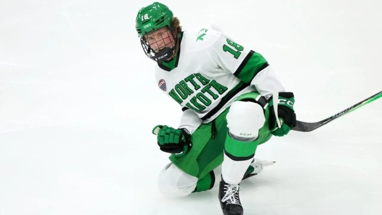 North Dakota University defenceman Keaton Verhoeff celebrates a goal.