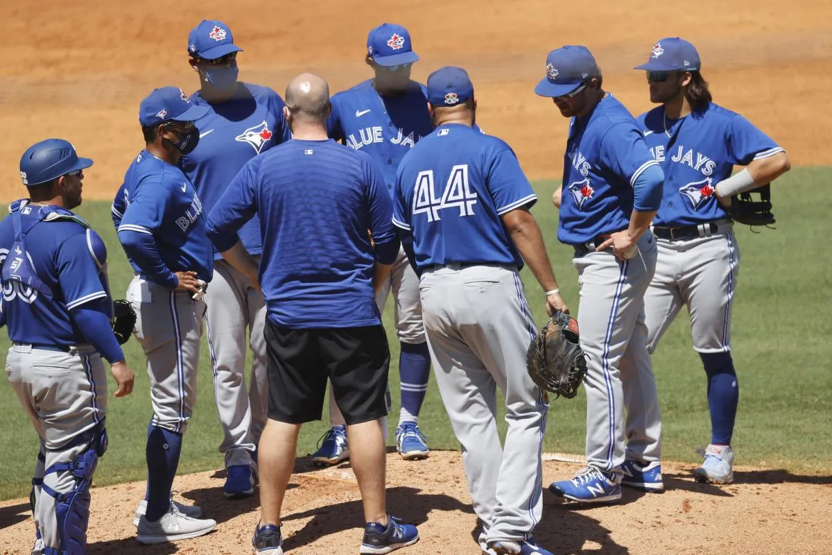 Toronto Blue Jays starting pitcher Anthony Kay (47) is taken out of the game after he got hit by a pitch during the third inning against the New York Yankees at George M. Steinbrenner Field.
