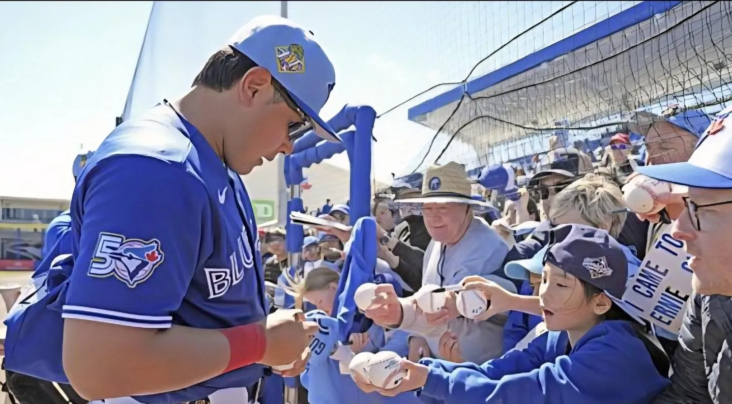 2026: Toronto Blue Jays third baseman Kazuma Okamoto signing autographs at TD Ballpark in Dunedin Florida USA.