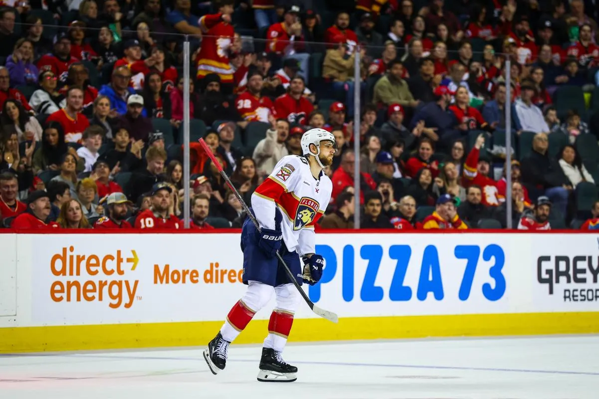 Florida Panthers left wing A.J. Greer (10) gets injected from the game during the third period against the Calgary Flames at Scotiabank Saddledome.