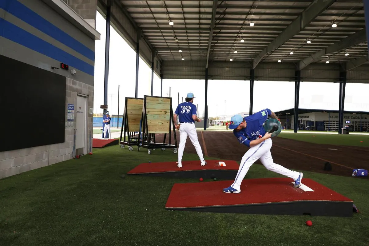 Toronto Blue Jays pitcher Yariel Rodriguez (29) and pitcher Trey Yesavage (39) workout for spring training at Blue Jays Player Development Complex.