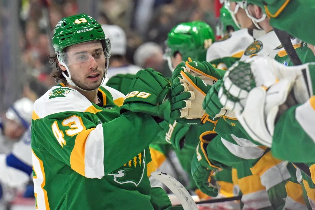 Minnesota Wild defensemen Quinn Hughes (43) celebrates his goal against the Tampa Bay Lightning during the third period at Grand Casino Arena.