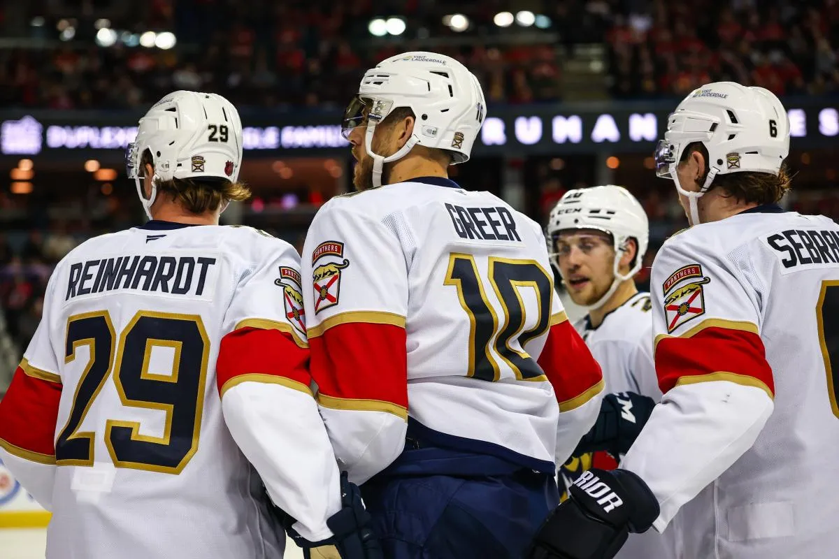 Florida Panthers left wing A.J. Greer (10) celebrates his goal with teammates against the Calgary Flames during the third period at Scotiabank Saddledome.