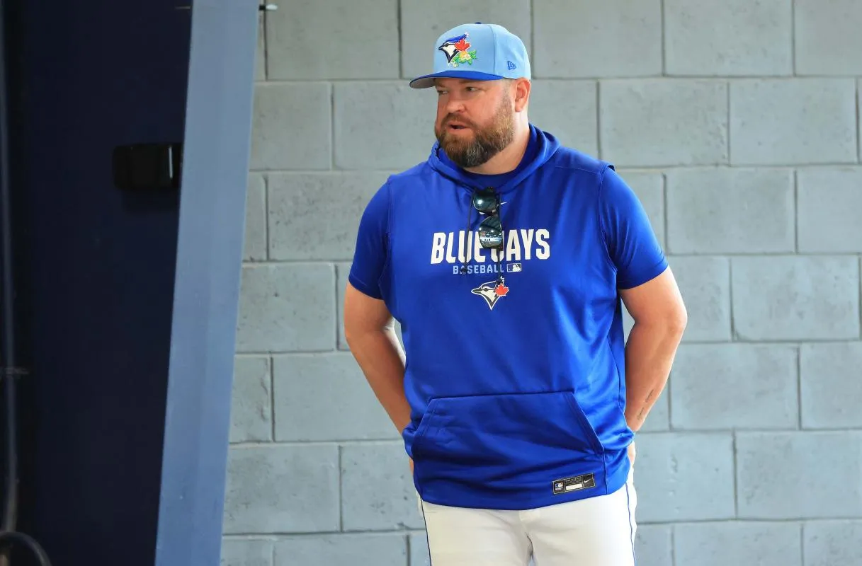 Toronto Blue Jays manager John Schneider (14) looks on for spring training practice at Blue Jays Player Development Complex.
