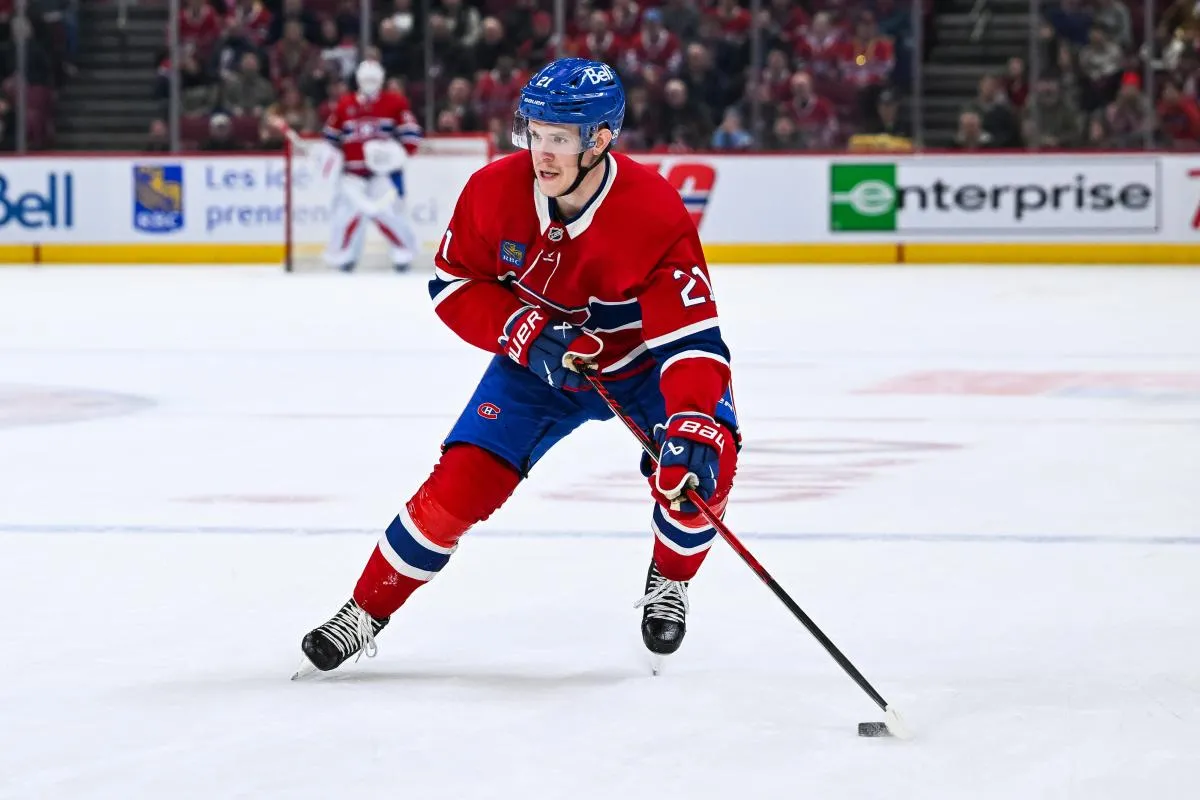 Montreal Canadiens defenseman Kaiden Guhle (21) plays the puck against the Anaheim Ducks during the first period at Bell Centre.