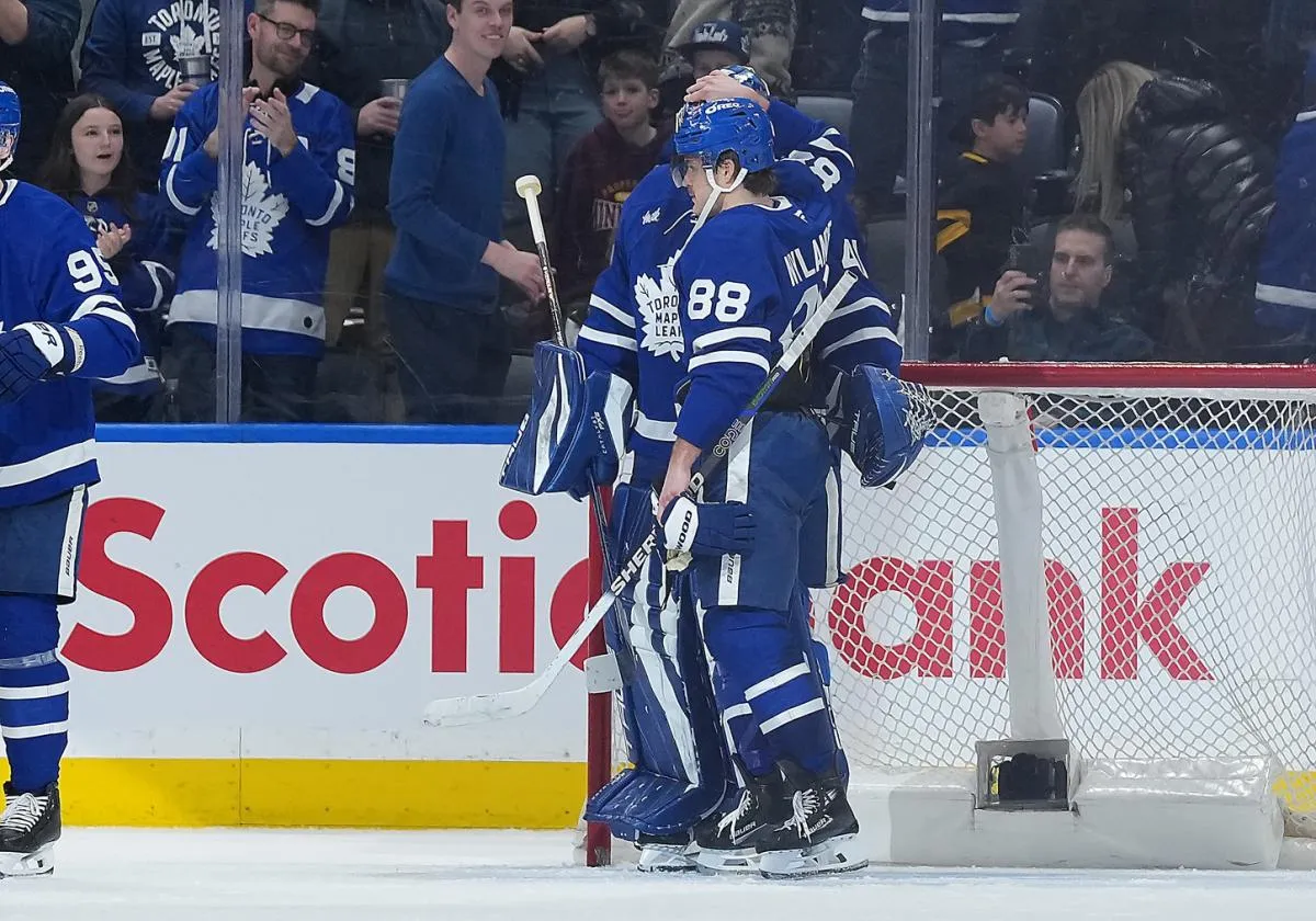 Toronto Maple Leafs right wing William Nylander (88) celebrates the win with goaltender Anthony Stolarz (41) against the Columbus Blue Jackets at the end of the third period at Scotiabank Arena.