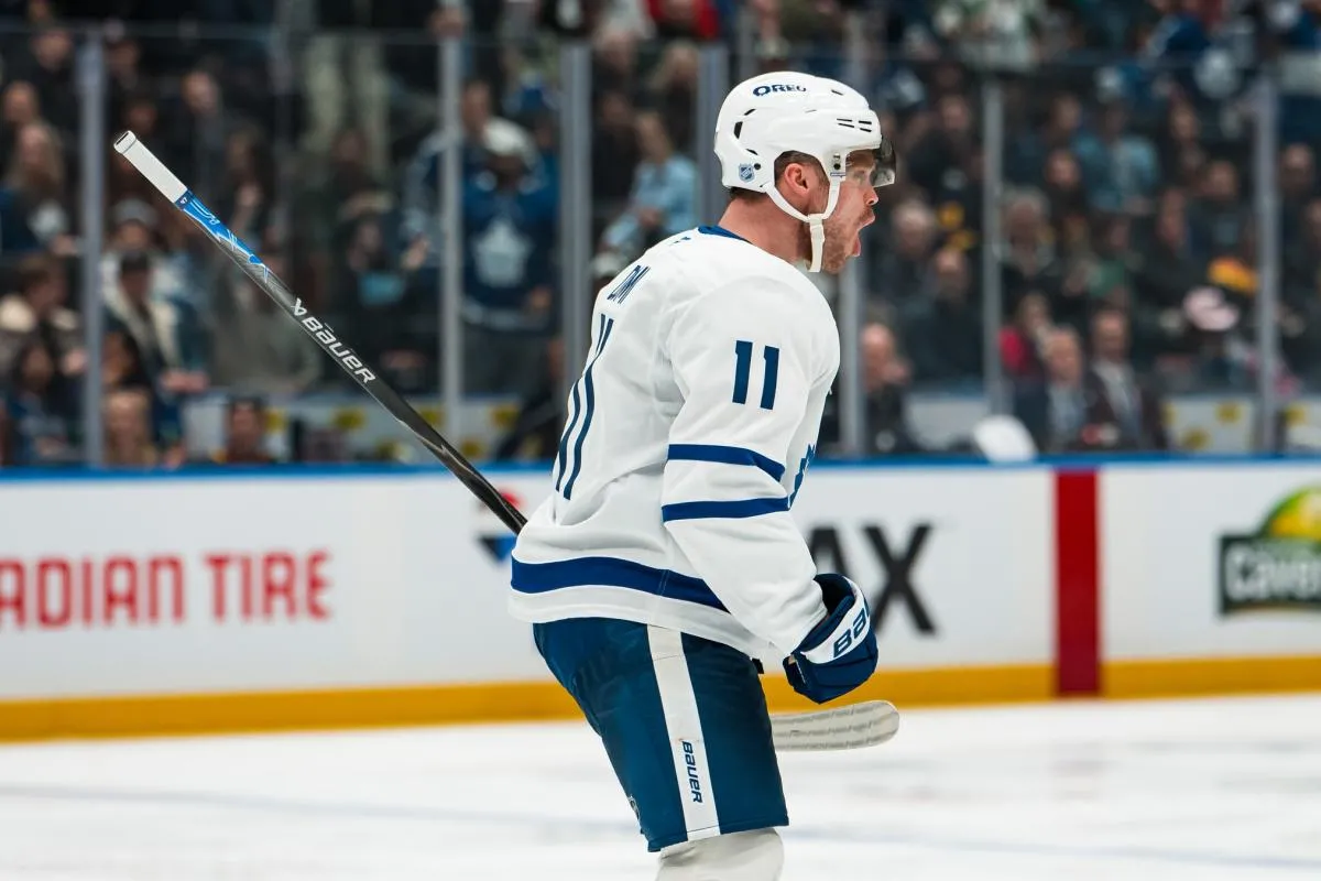 Toronto Maple Leafs forward Max Domi (11) celebrates his goal against the Vancouver Canucks in the third period at Rogers Arena.