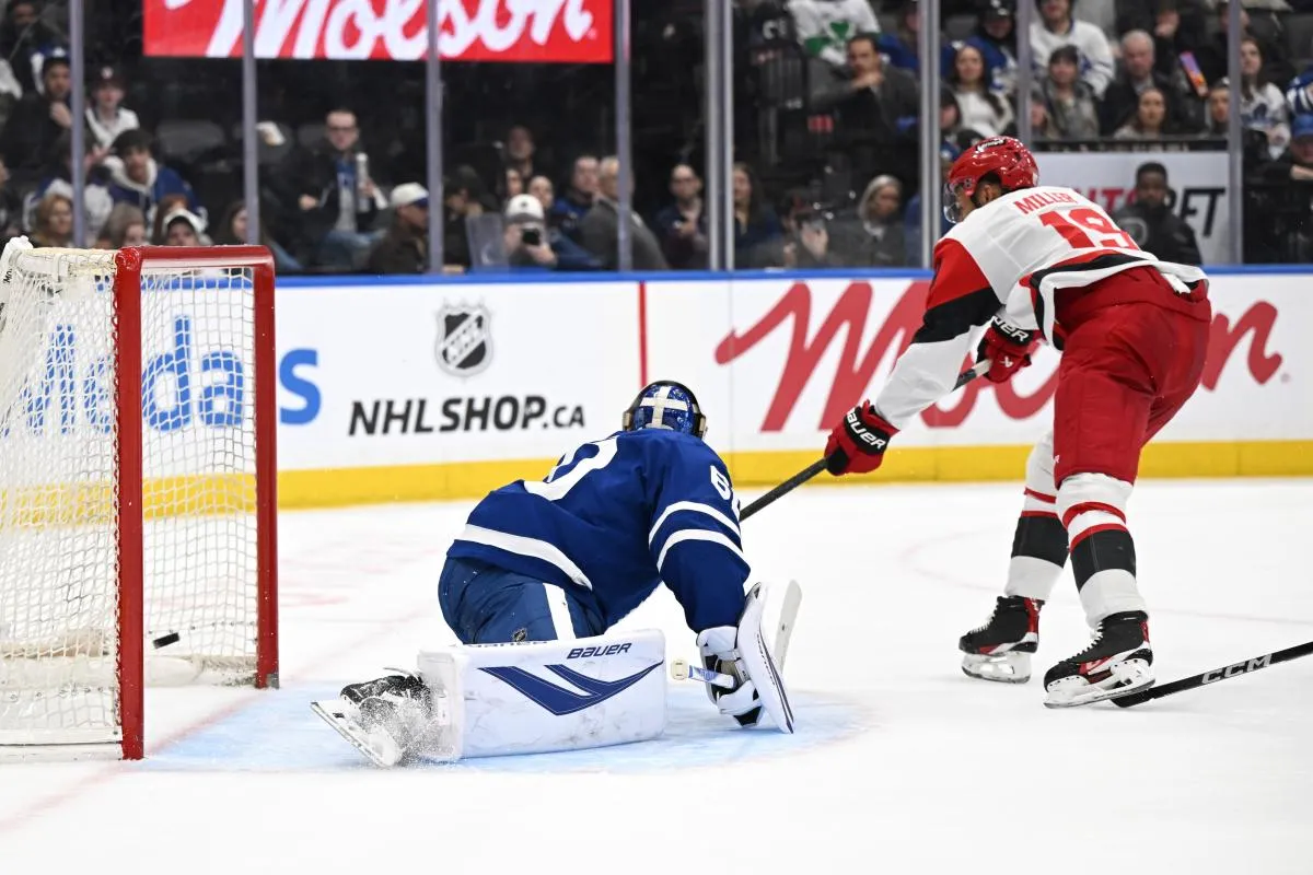 Carolina Hurricanes defenseman K'Andre Miller (19) scores a goal past Toronto Maple Leafs goalie Joseph Woll (60) in the second period at Scotiabank Arena.