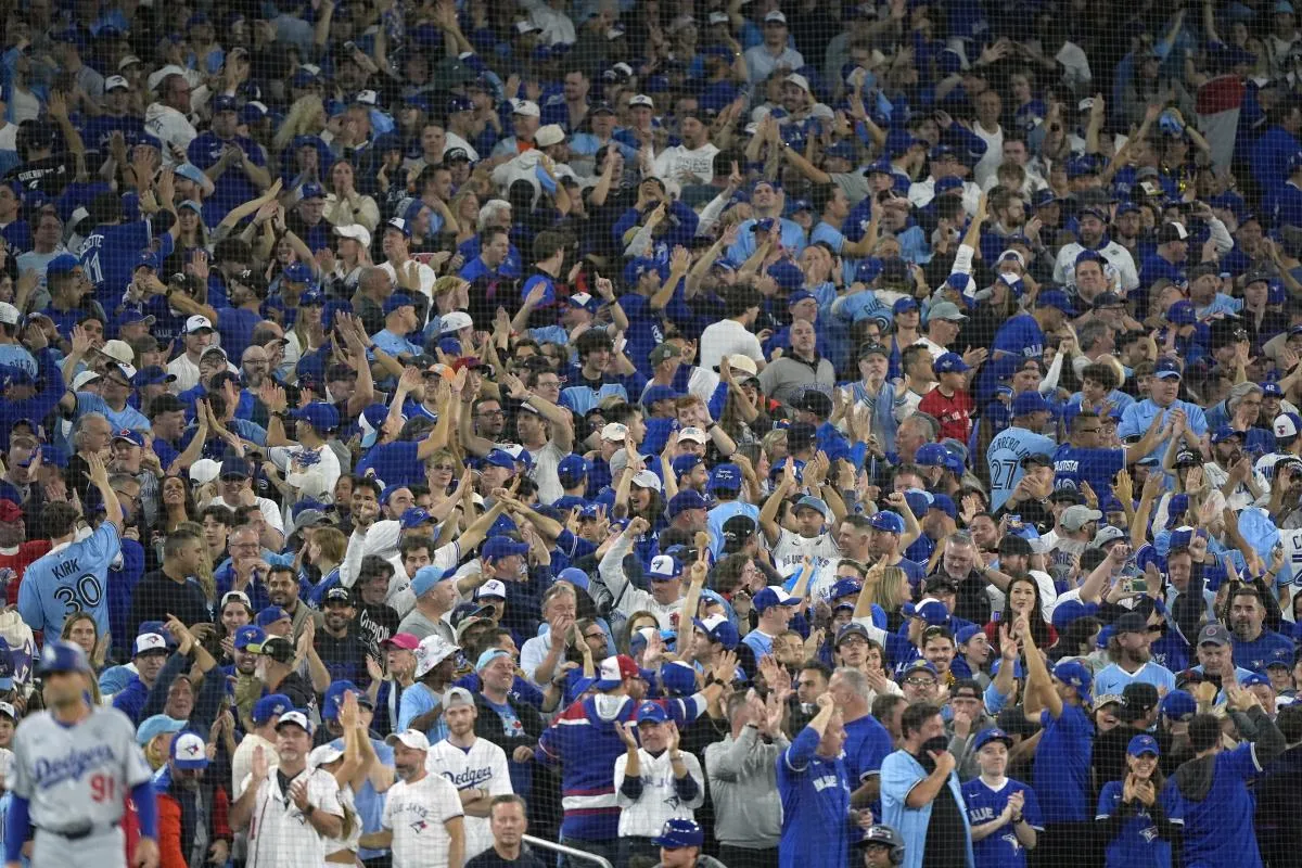 Fans cheer in the ninth inning between the Toronto Blue Jays and the Los Angeles Dodgers during game seven of the 2025 MLB World Series at Rogers Centre.