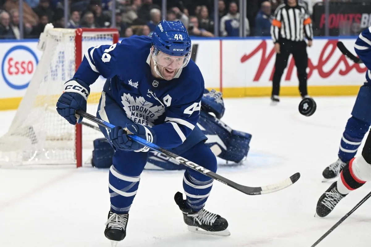 Toronto Maple Leafs defenseman Morgan Rielly (44) pursues the puck against the Ottawa Senators in the second period at Scotiabank Arena.