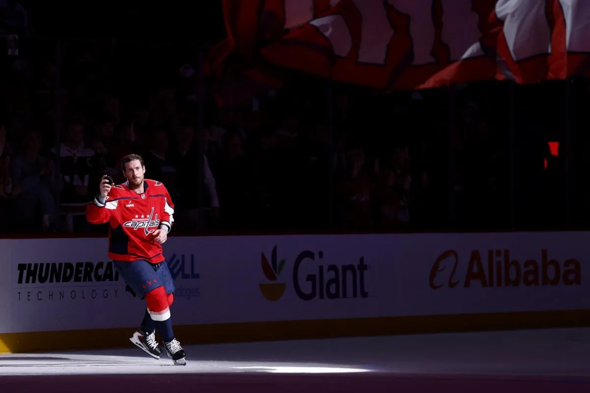 Washington Capitals left wing Pierre-Luc Dubois (80) waves to the crowd after being name number one star of the game against the Vegas Golden Knights at Capital One Arena.
