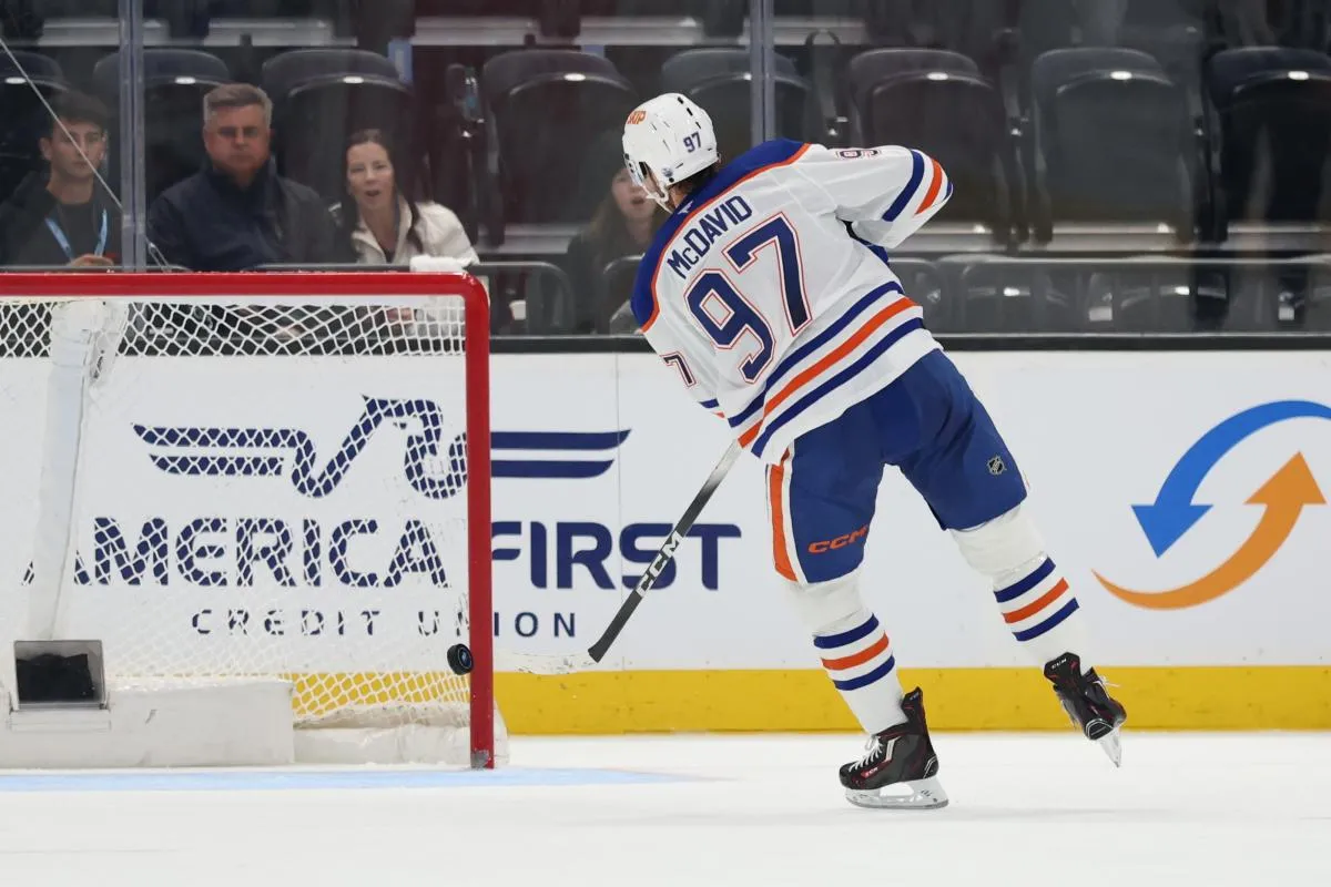 Edmonton Oilers center Connor McDavid (97) scores a goal on an open net during the third period of a game against the Utah Mammoth at Delta Center.
