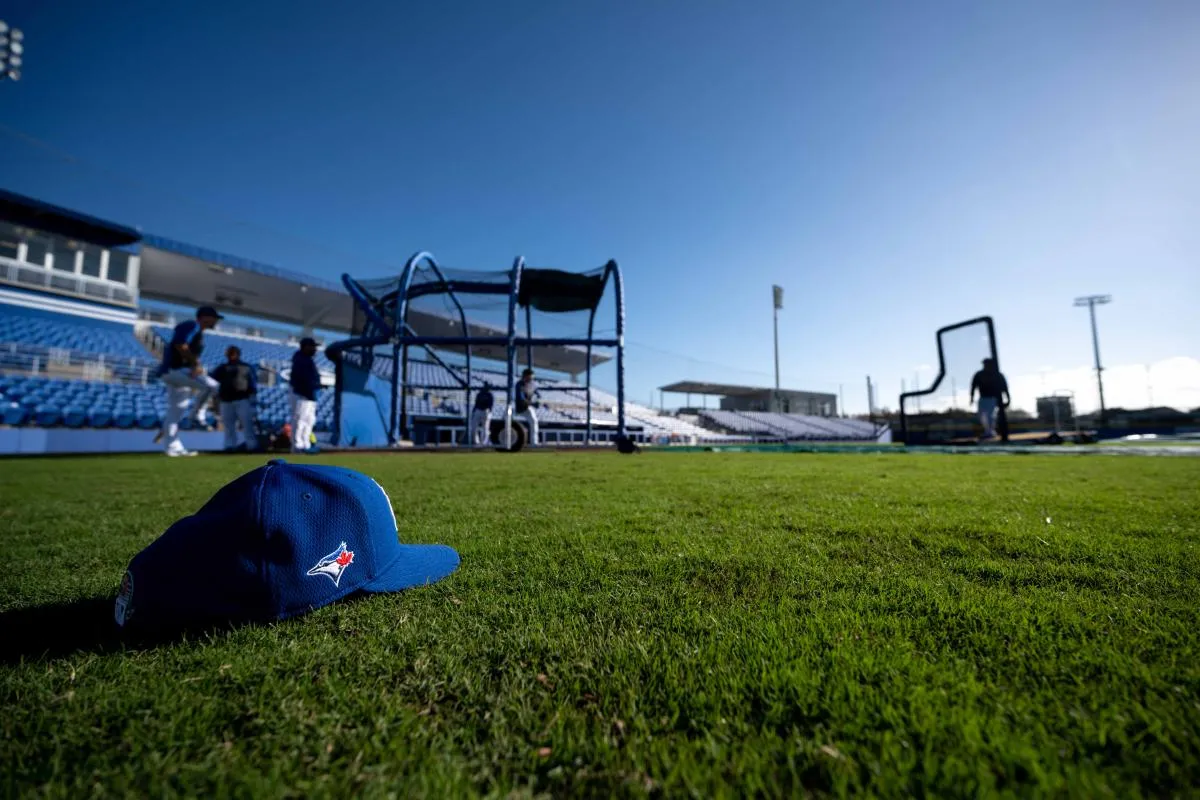 General view of a Toronto Blue Jays hat on the field during spring training at Spectrum Field.