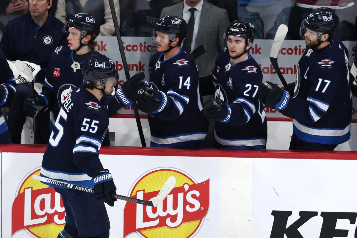 Winnipeg Jets center Mark Scheifele (55) celebrates a goal against the Colorado Avalanche in the third period at Canada Life Centre.