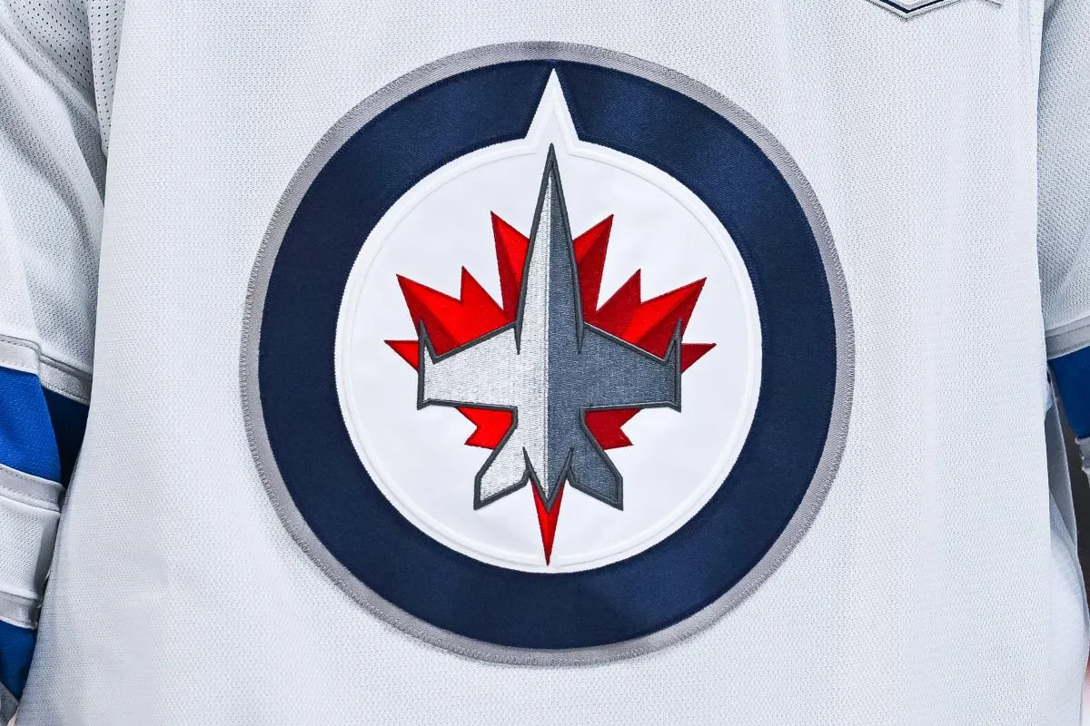 View of a Winnipeg Jets logo on a jersey worn by a member of the team during the first period at Bell Centre.