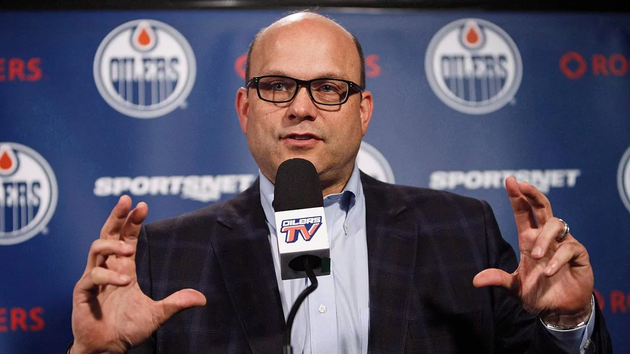 Former Edmonton Oilers GM Pete Chiarelli speaking to the media during a press conference.
