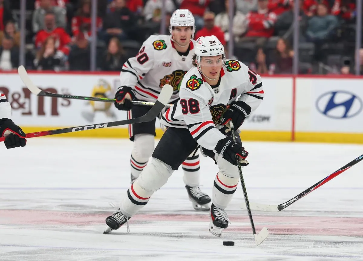 Chicago Blackhawks center Connor Bedard (98) skates with the puck against the New Jersey Devils during the third period at Prudential Center.