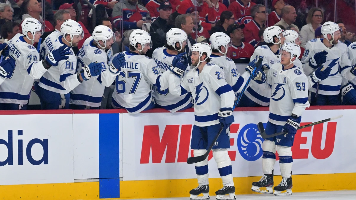 Tampa Bay Lightning forward Brayden Point (21) celebrates with teammates after scoring a goal against the Montreal Canadiens during the first period in game three of the first round of the 2026 Stanley Cup Playoffs at the Bell Centre.