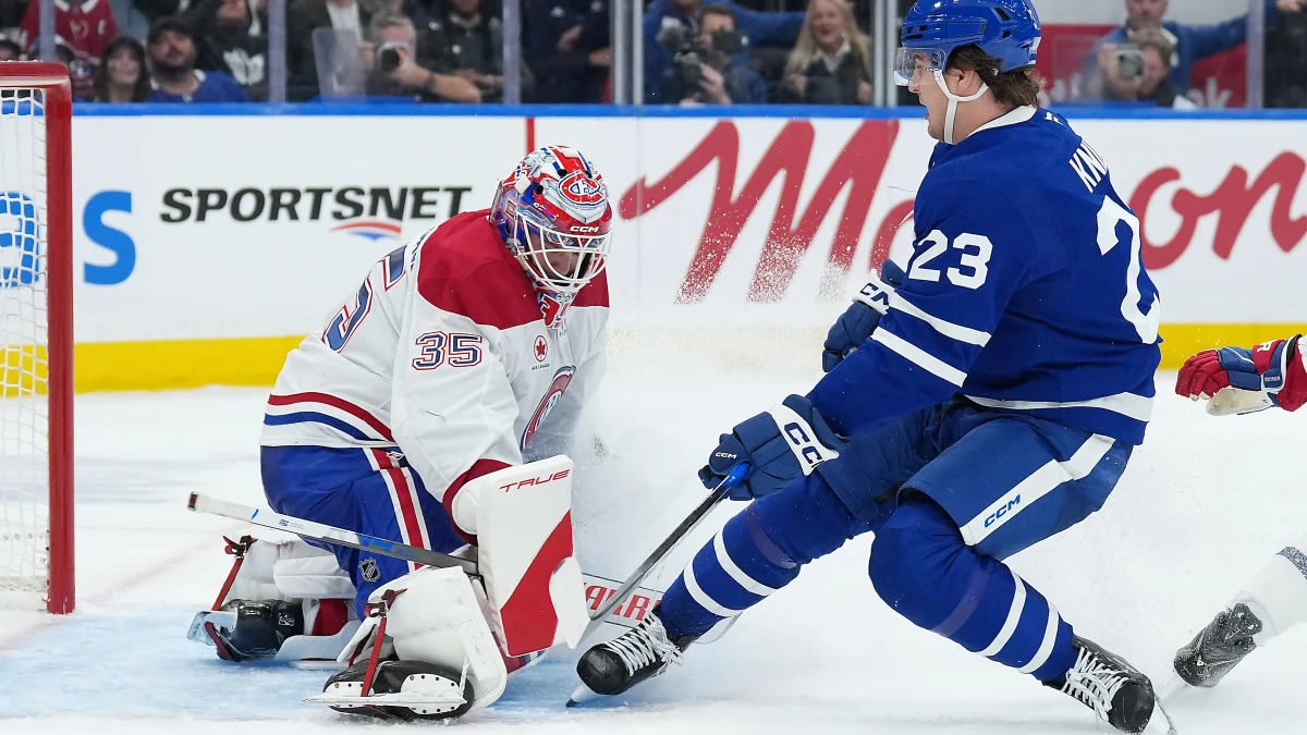 Toronto Maple Leafs left wing Matthew Knies (23) battles in front of Montreal Canadiens goaltender Sam Montembeault (35) during the third period at Scotiabank Arena.