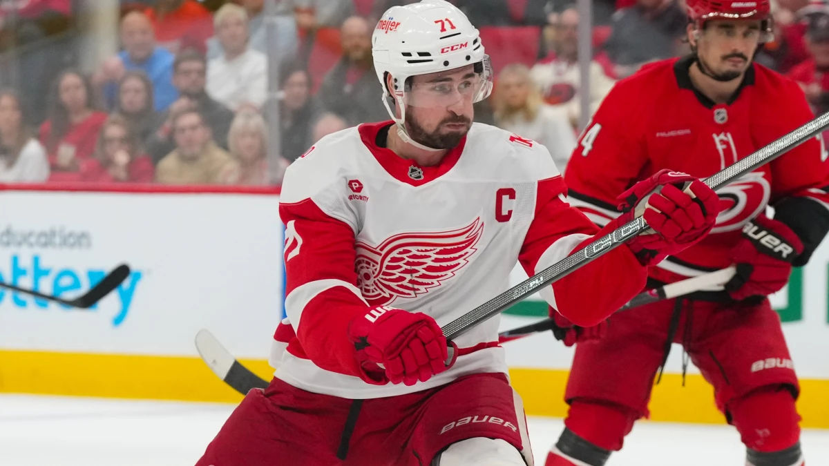 Detroit Red Wings center Dylan Larkin (71) takes a shot against the Carolina Hurricanes during the second period at Lenovo Center.