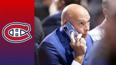 Kent Hughes au t&eacute;l&eacute;phone au rep&ecirc;chage