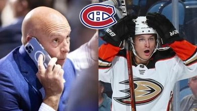 Kent Hughes au t&eacute;l&eacute;phone et Trevor Zegras avec les Ducks d'Anaheim