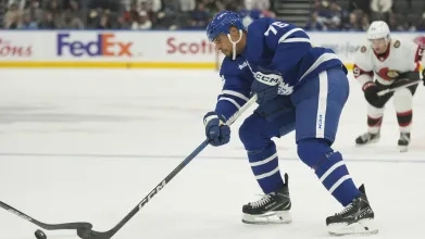 Ryan Reaves takes a shot for the Toronto Maple Leafs.